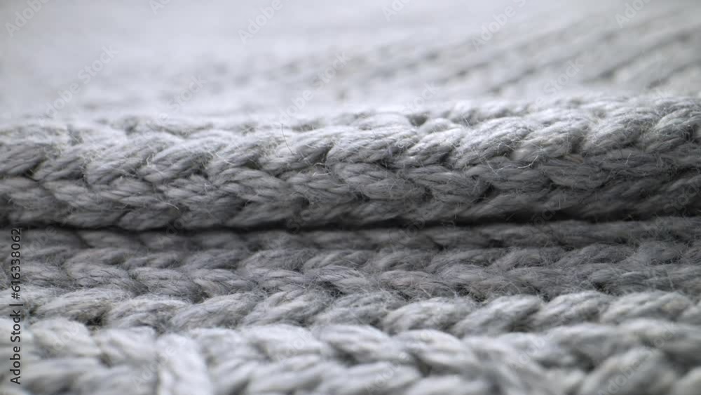 The structure of the fabric. Close-up of knitted cotton fabric. Dolly shot The structure of the fabric. Close-up of knitted cotton fabric. Dolly shot