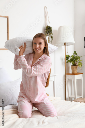 Pretty young woman playing ...