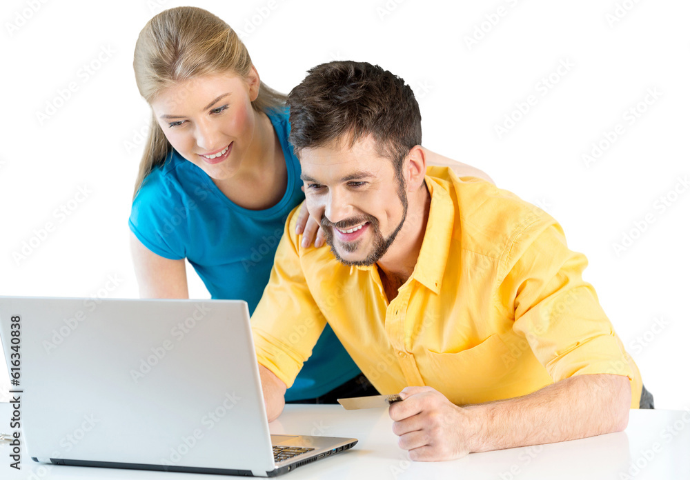 Young cute couple working together with laptop