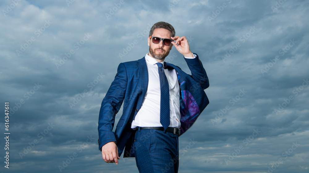 photo of mature businessman in suit. businessman in suit on sky background. photo of mature businessman in suit. businessman in suit on sky background.