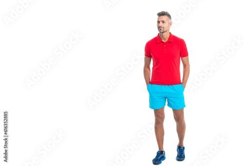 sporty sportsman in sport clothes isolated on white, copy space. Sportsman wear sports uniform and looking at camera. athletic sportsman in working out over studio background. sportsman after working