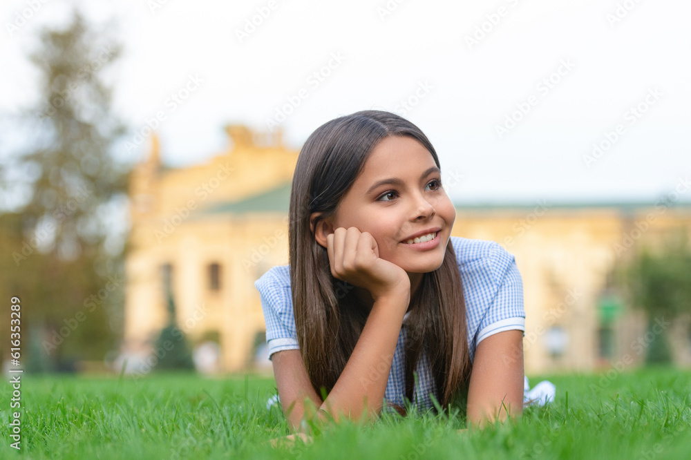 glad girl relax at summer lawn outdoor, copy space. photo of girl relax at summer lawn. glad girl relax at summer lawn outdoor, copy space. photo of girl relax at summer lawn.