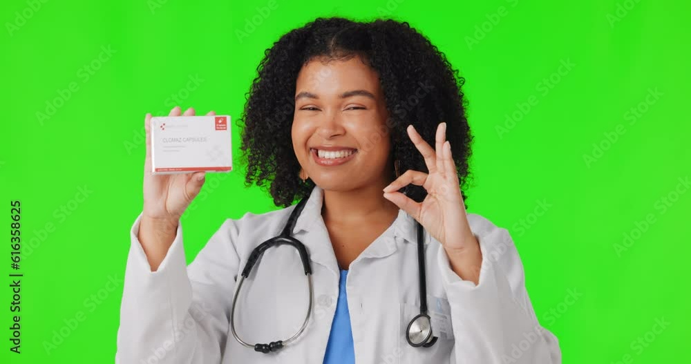 Okay, green screen or happy woman doctor with business card advertising healthcare infomation. Face portrait, good or nurse with hand gesture for approval, yes or like sign in studio for promotion Okay, green screen or happy woman doctor with business card advertising healthcare infomation. Face portrait, good or nurse with hand gesture for approval, yes or like sign in studio for promotion