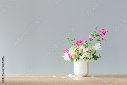 Wallpaper Mural summer flowers in ceramic cup on light background Torontodigital.ca