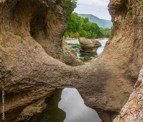 summer landscape with a river in a mountain canyon in the foothills of the Caucasus