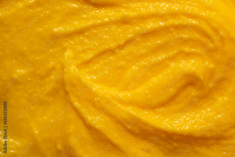 Fruit yogurt ice cream. Smoothies from fresh fruits and berries. Ice cream texture. Delicious sweet dessert close-up as a background. Fruit yogurt ice cream. Smoothies from fresh fruits and berries. Ice cream texture. Delicious sweet dessert close-up as a background.