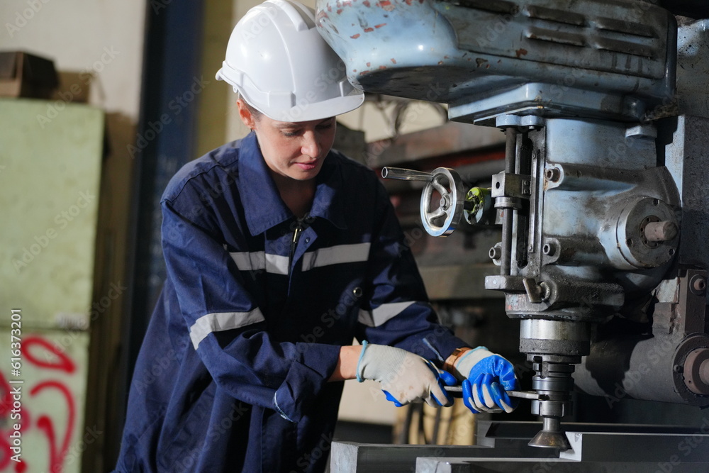 Industrial Engineer at work in factory, industrial engineers working at automated AI robotic production factory - New technology concept Industrial Engineer at work in factory, industrial engineers working at automated AI robotic production factory - New technology concept