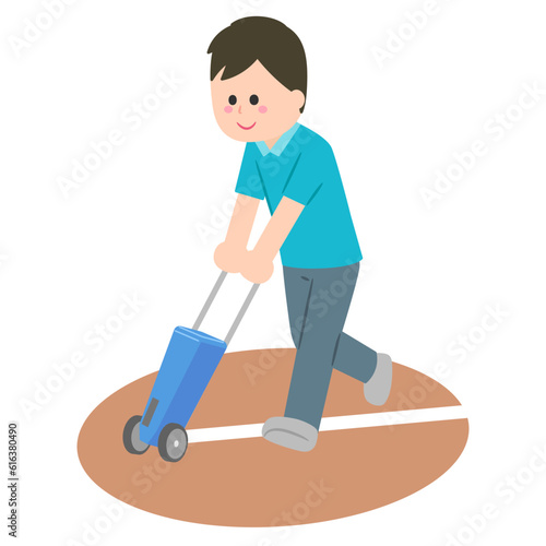 ラインカーで白線を引く男性
