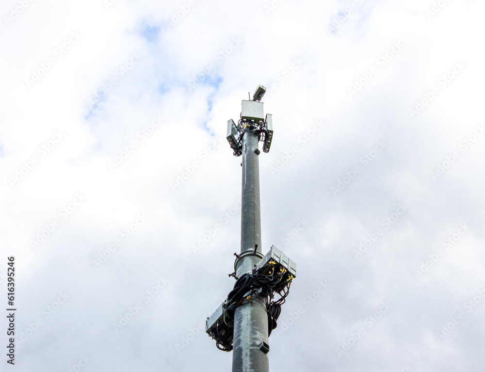 Industrial tower tower with cellular antennas for mobile internet network. Communications tower. Telecommunications tower. Industrial tower tower with cellular antennas for mobile internet network. Communications tower. Telecommunications tower.