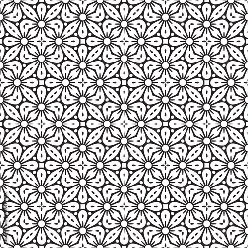 Luxury ornamental mandala design background in black and white colour. Seamless vector background. The geometric pattern by stripes, lines, rhombuses. © Bharat