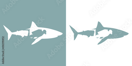 Logo club de submarinismo. Silueta de gran tiburón blanco con submarinista en espacio negativo photo