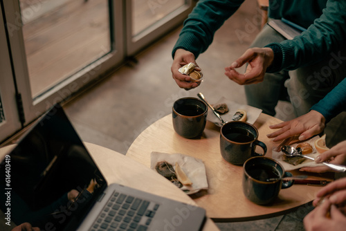 Close up shot of man putting honey in his tea