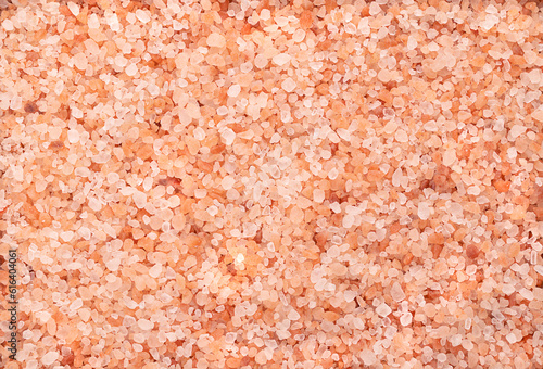 Himalayan salt, coarse crystals, from above. Rock salt, halite, with a pinkish tint, due to trace minerals, mined from the Punjab region, primarily used as a food additive or to replace table salt.