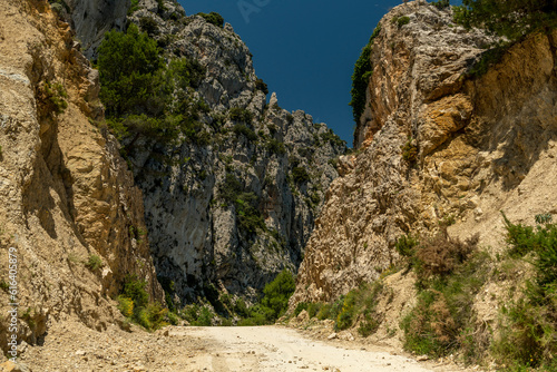 Pass del Comptador, the pass between Sella and Guadalest, small gravel mountain road used by cyclists, Costa Blanca, Alicante, Spain - stock photo
