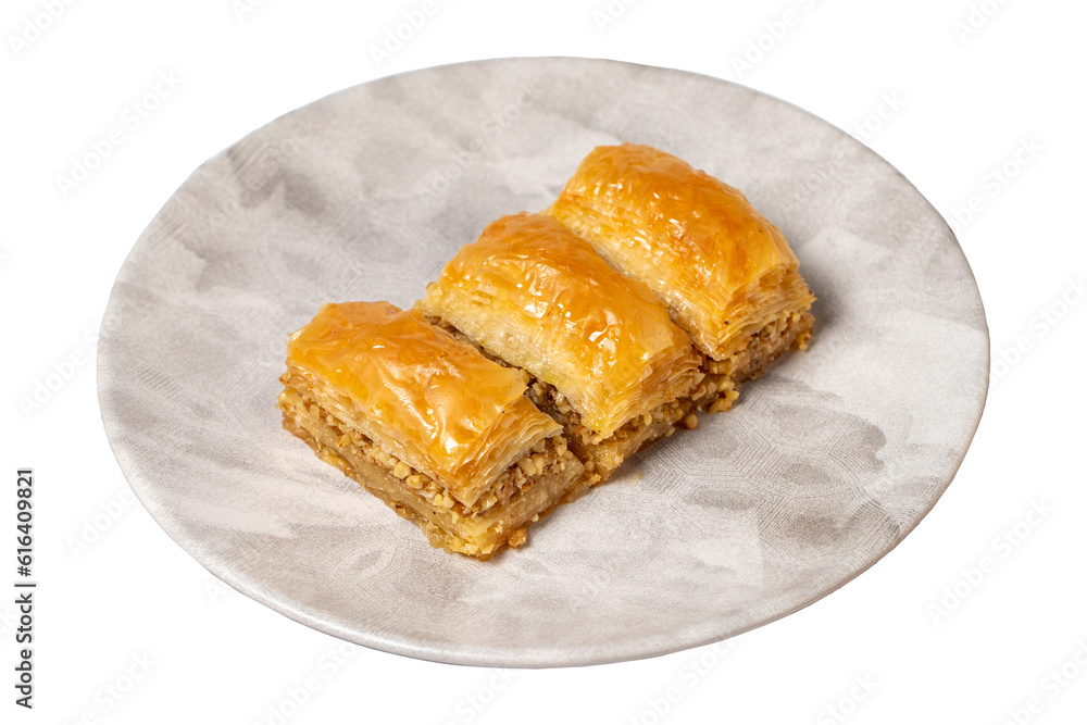 Walnut baklava isolated on white background. Turkish cuisine delicacies. Turkish baklava. close up Walnut baklava isolated on white background. Turkish cuisine delicacies. Turkish baklava. close up