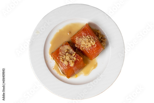 Wallpaper Mural Zucchini dessert with tahini isolated on white background. Traditional Turkish cuisine delicacies. Local name tahinli kabak tatlisi. close up Torontodigital.ca