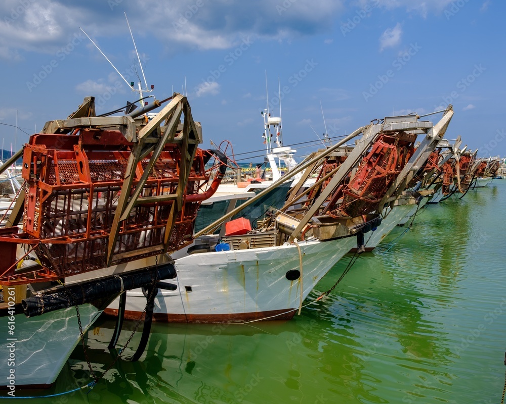 Fishing boats moored in the port of the city of Fano in the Marche region, Italy Fishing boats moored in the port of the city of Fano in the Marche region, Italy