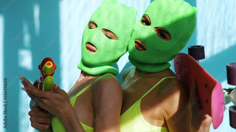 Two beautiful sexy women in green underwear. Models wearing bandit