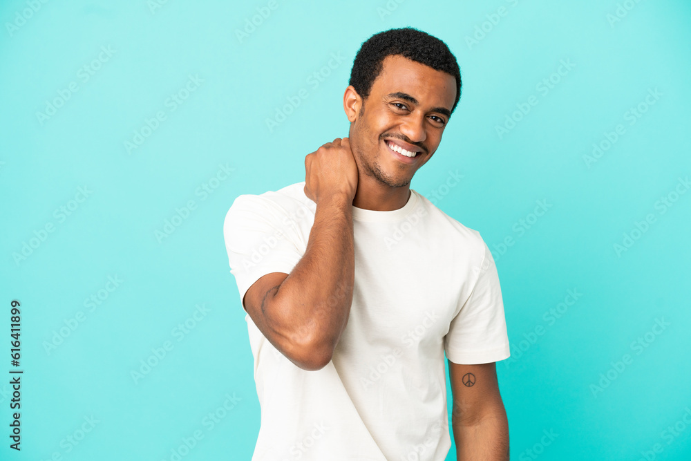 African American handsome man on isolated blue background laughing African American handsome man on isolated blue background laughing