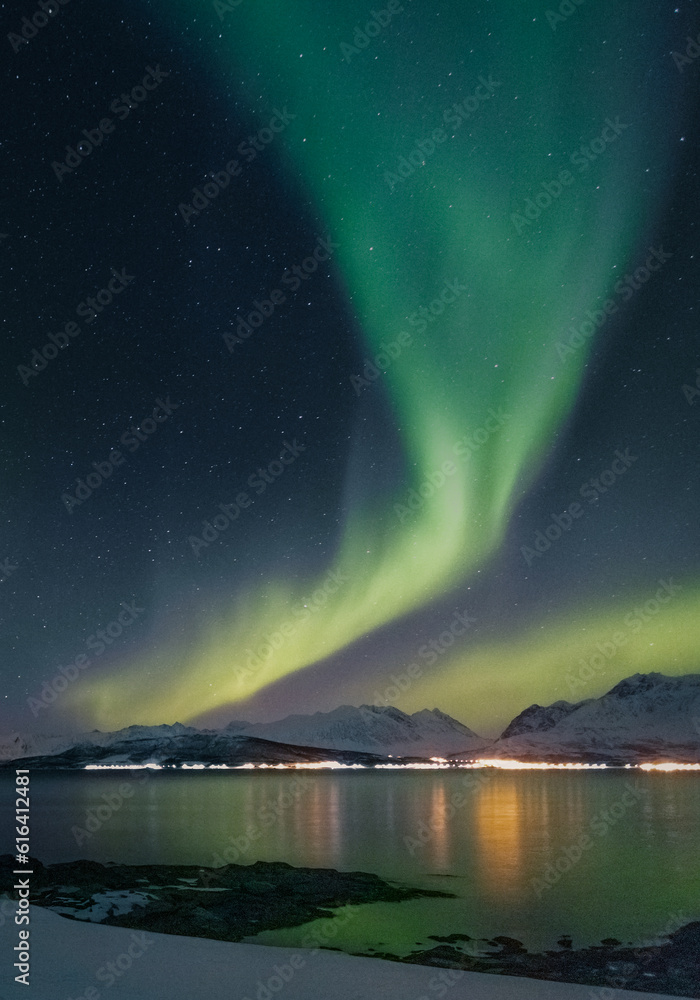 Aurora borealis over the Lyngen Alps in Arctic Norway