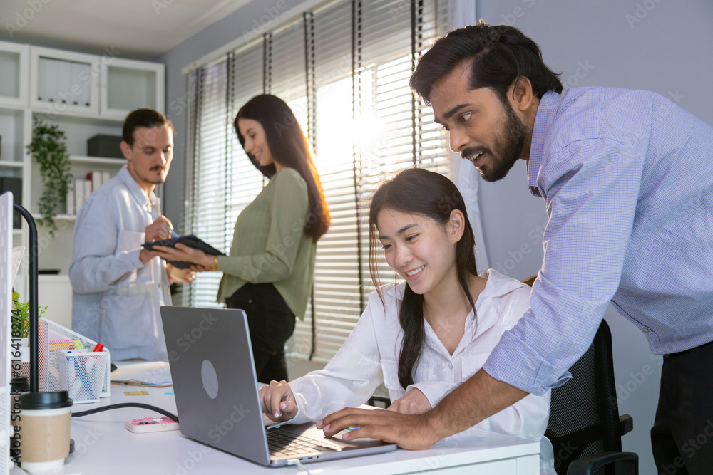 Group of multiethnic young business friends gathered in a modern office conference room and worked as a team. Group of multiethnic young business friends gathered in a modern office conference room and worked as a team.