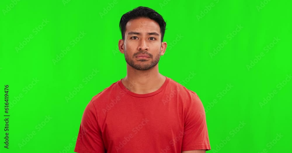 Warning, serious and face of an Asian man on a green screen with a no, stop or rejection. Refuse, negative and portrait of a person with a hand gesture for disapproval isolated on a studio background Warning, serious and face of an Asian man on a green screen with a no, stop or rejection. Refuse, negative and portrait of a person with a hand gesture for disapproval isolated on a studio background