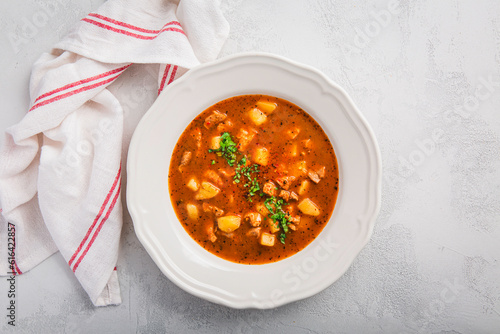 Hungarian hot goulash soup, beef, tomato, pepper, chili, smoked paprika soup photo