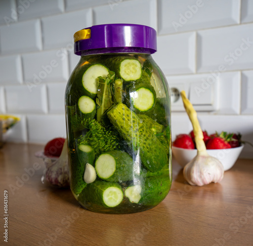 Ogórki zielone kiszone małosolne słoik. Pickled green cucumbers in a jar