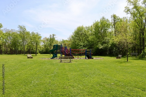 The children playground area in the park on a sunny day.