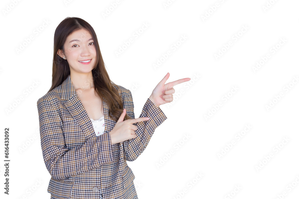 Asian professional female with black long hair wearing a plaid suit and pretty smiling looking at camera is present product on white background. Asian professional female with black long hair wearing a plaid suit and pretty smiling looking at camera is present product on white background.