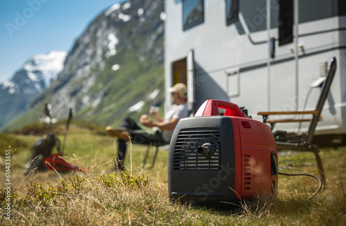 Obraz na płótnie Using Portable Gasoline Inverted Generator While Dry Camping