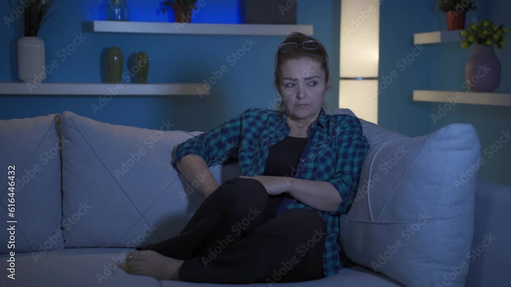At night at home, paranoid woman dreams in her head and is afraid. At night at home, paranoid woman dreams in her head and is afraid.