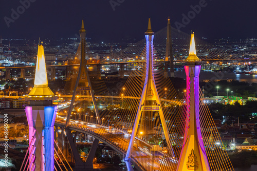 Aerial view of Bhumibol Bridge and Chao Phraya River in structure architecture concept, Urban city, Bangkok. Downtown area at night, Thailand
 photo