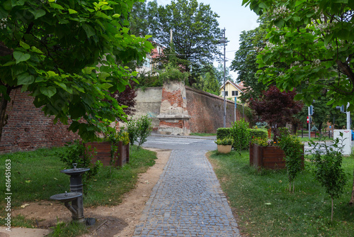 A square overlooking the historic defensive wall in the city of Sibiu. Transylvania. Romania