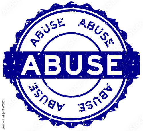 Grunge blue abuse word round rubber seal stamp on white background