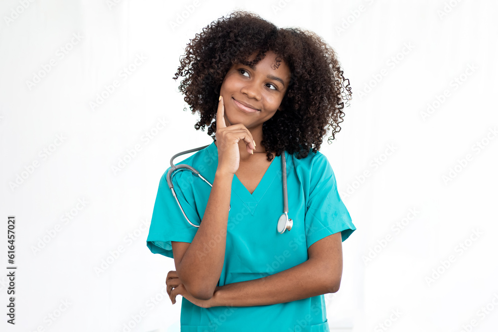 Medical doctor indoors portraits. Portrait of a confident doctor working at a hospital. Waist up portrait of beautiful African-American nurse with positive thinking. Medical doctor indoors portraits. Portrait of a confident doctor working at a hospital. Waist up portrait of beautiful African-American nurse with positive thinking.