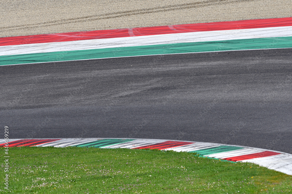 Obraz premium colored curbs on a racing track