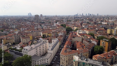 Europe, Italy, Milan Drone aeriel view of skyline with modern skyscrapers from Milano Cortina 2026 Olympic Village - city landscape from Corso Lodi Porta Romana 