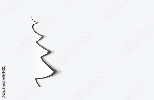 pepercut christmastree on shadows white and gray blackground 