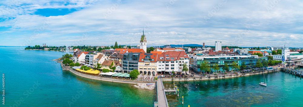 Germany, Friedrichshafen city coast of bodensee lake, houses at promenade lakeside in summer, aerial panorama view above XXL