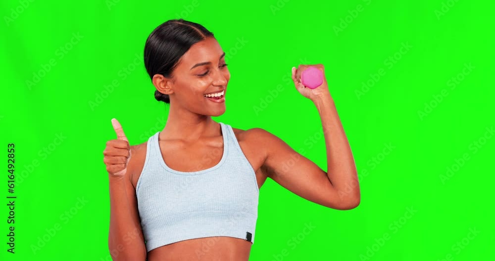 Fitness, green screen and woman with thumbs up in portrait, flexing arm with dumbbell and smile. Progress, winning and happy girl with success in sports, training and emoji for healthy exercise goal Fitness, green screen and woman with thumbs up in portrait, flexing arm with dumbbell and smile. Progress, winning and happy girl with success in sports, training and emoji for healthy exercise goal