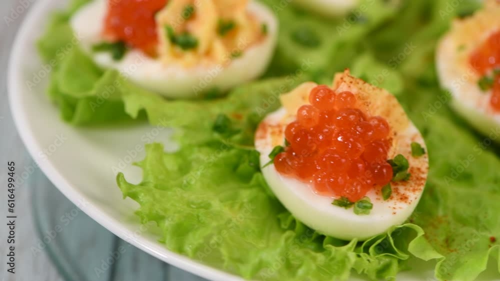 What a festive table without stuffed eggs, add piquancy in the form of red pepper and red caviar, and your appetizer will sparkle with a new taste. How to cook stuffed eggs. What a festive table without stuffed eggs, add piquancy in the form of red pepper and red caviar, and your appetizer will sparkle with a new taste. How to cook stuffed eggs.