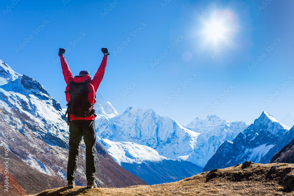 Victorious man Enjoying the Success in Himalayas Mountains, Nepal