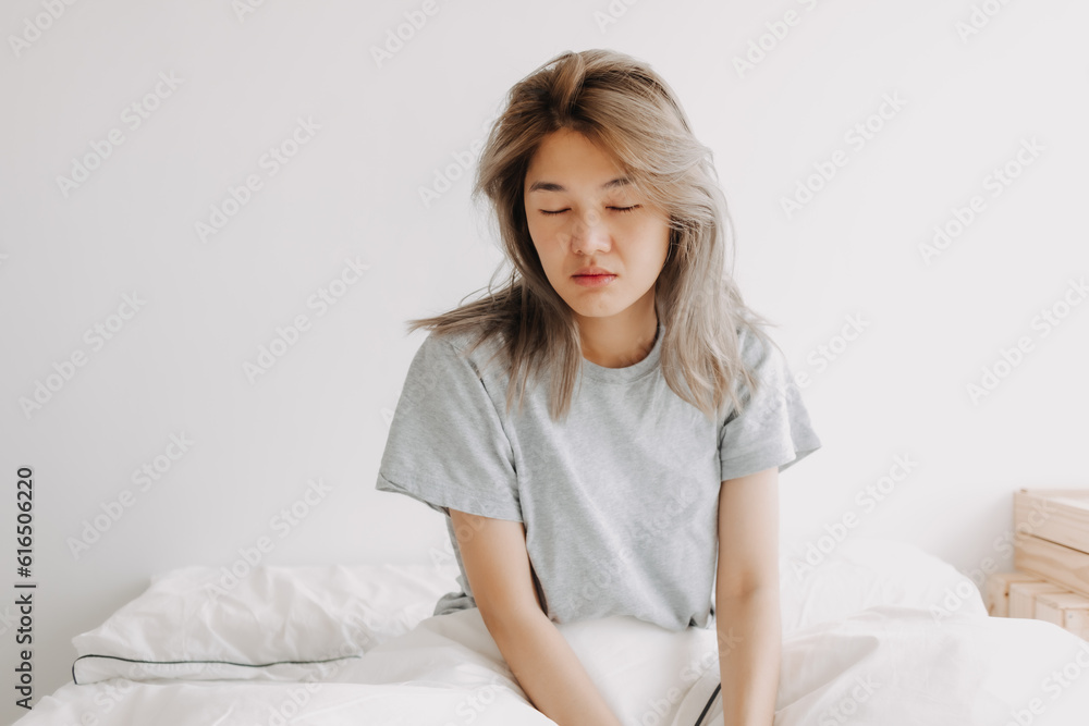 Funny face sleepy head asian woman just wake up in the morning dizzy and lazy. Funny face sleepy head asian woman just wake up in the morning dizzy and lazy.