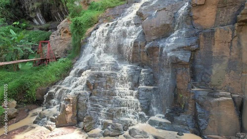 Aerial Curug Batu Templek Cisanggarung Waterfall in Bandung West Java Indonesia photo