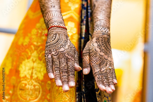 Indian Hindu bride's wedding henna mehendi mehndi hands close up © Stella Kou