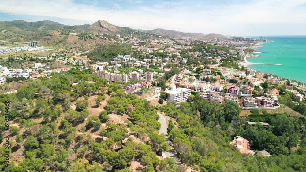 Malaga, Andalusia. Aerial view of city skyline from the castle on a beautiful spring day Malaga, Andalusia. Aerial view of city skyline from the castle on a beautiful spring day