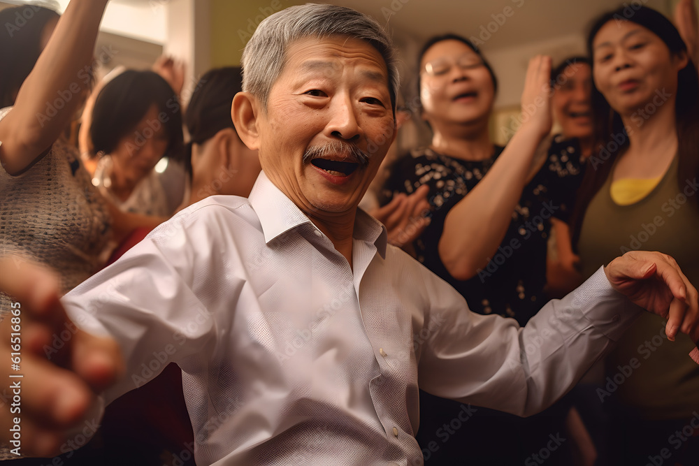 Funny Image Of A Senior Asian Man Trying Out A Popular Dance Move At A