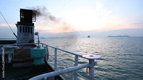 Smoke from black chimneys on board ferries or cruise ships