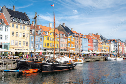 Nyhavn (Danish: New Harbour) is a 17th-century waterfront, canal and entertainment district in Copenhagen, Denmark